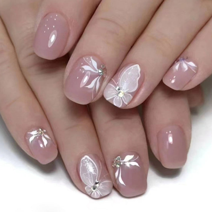 Artistic Butterfly-Inspired Nail Extensions Bowlift