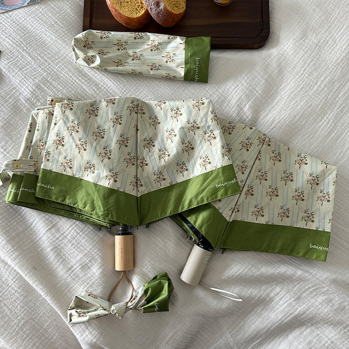 Ladies elegant folding umbrella with floral design Bowlift