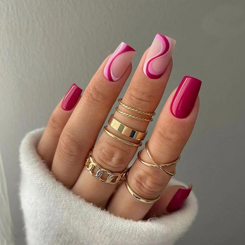 Artistic acrylic nails with elegant color gradients and glitter Bowlift