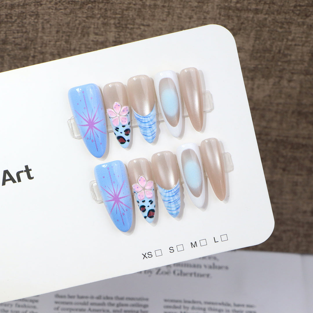 Artistic Stiletto Press-On Nail Set with Floral and Abstract Patterns Bowlift