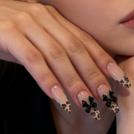 Artistic Press-On Nail Set with Leopard Print and Bow Accents Bowlift