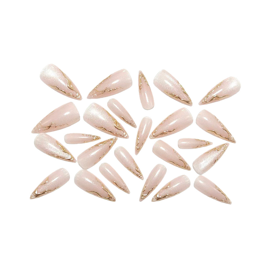 Artificial nails in elegant stiletto design with golden accents Bowlift