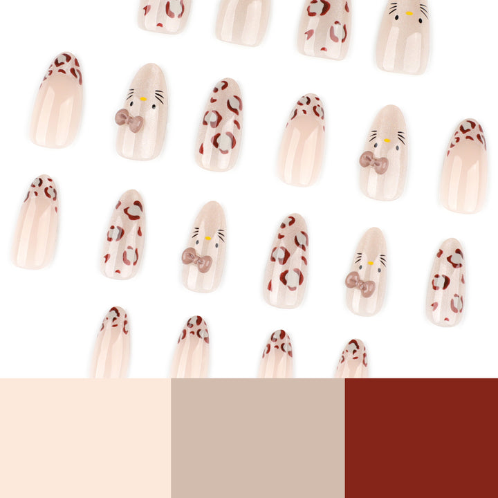 Creative Nail Art with Cute Cat Motif and Glitter Accents Bowlift