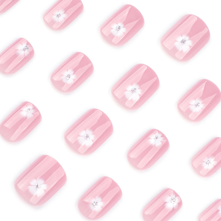 Elegant artificial nails with filigree floral motifs and glitter accents Bowlift