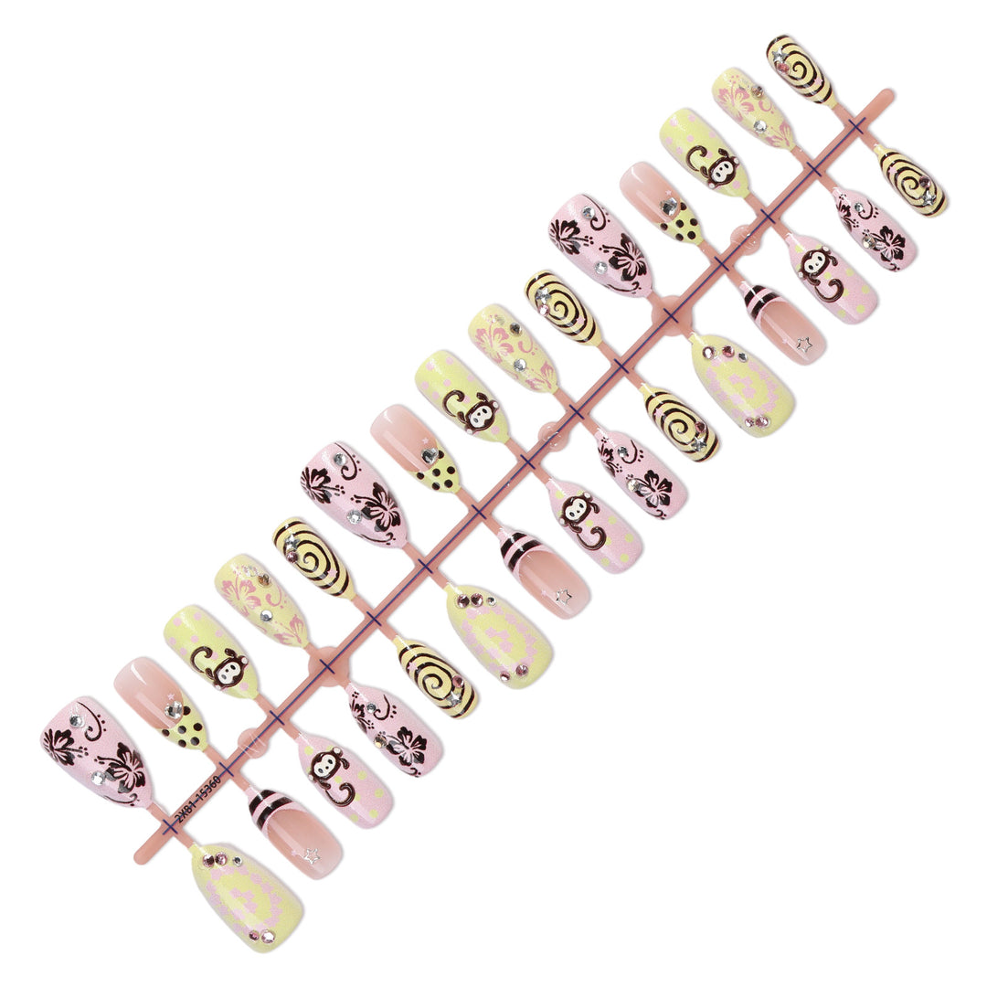 Creative nail art set with playful monkey designs and glitter details Bowlift
