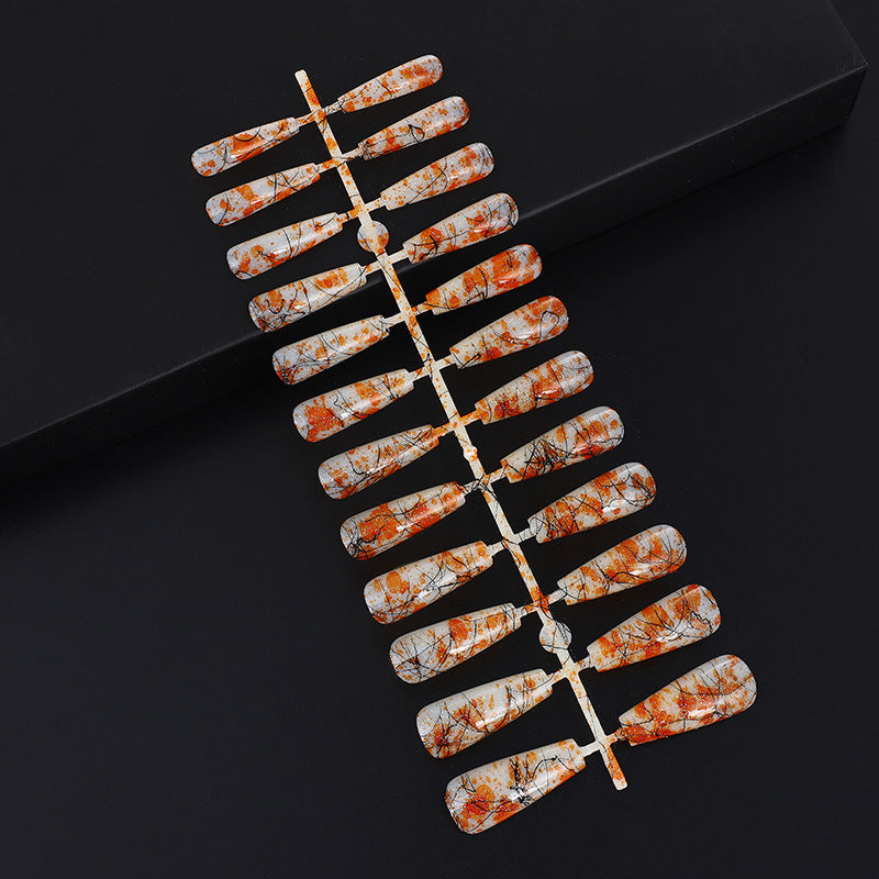 Creative nail art with blood splatter design Bowlift