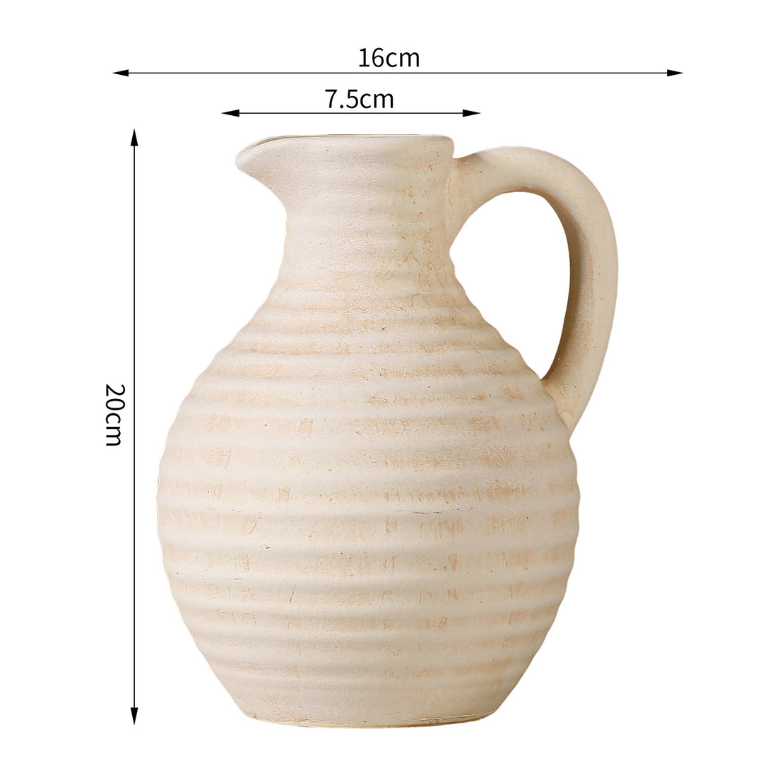 Handcrafted ceramic vase with ribbed structure Bowlift
