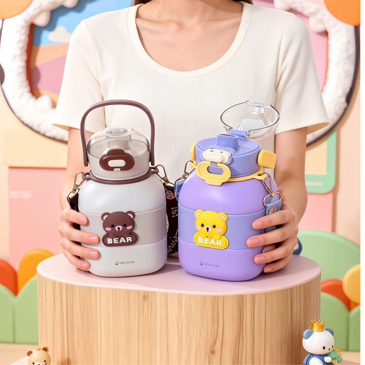 Child-friendly water bottle with carrying strap Bowlift