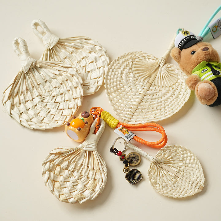 Women handmade fan made of natural material Bowlift