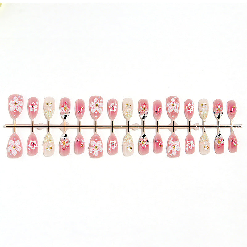 Artificial nail set with elegant floral accents Bowlift