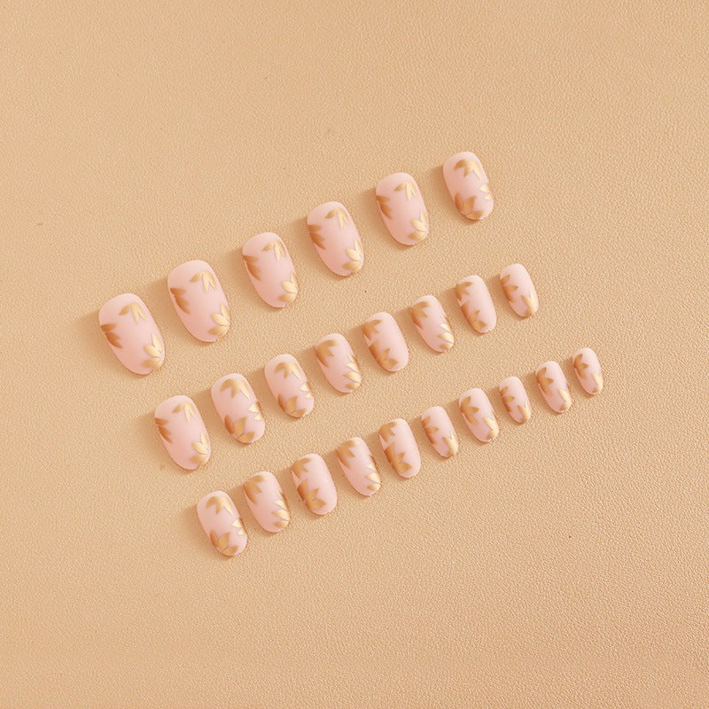 Artificial nail set with elegant gold leaf design Bowlift