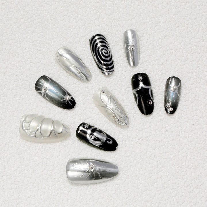 Artificial nails with metallic effects and complex designs Bowlift