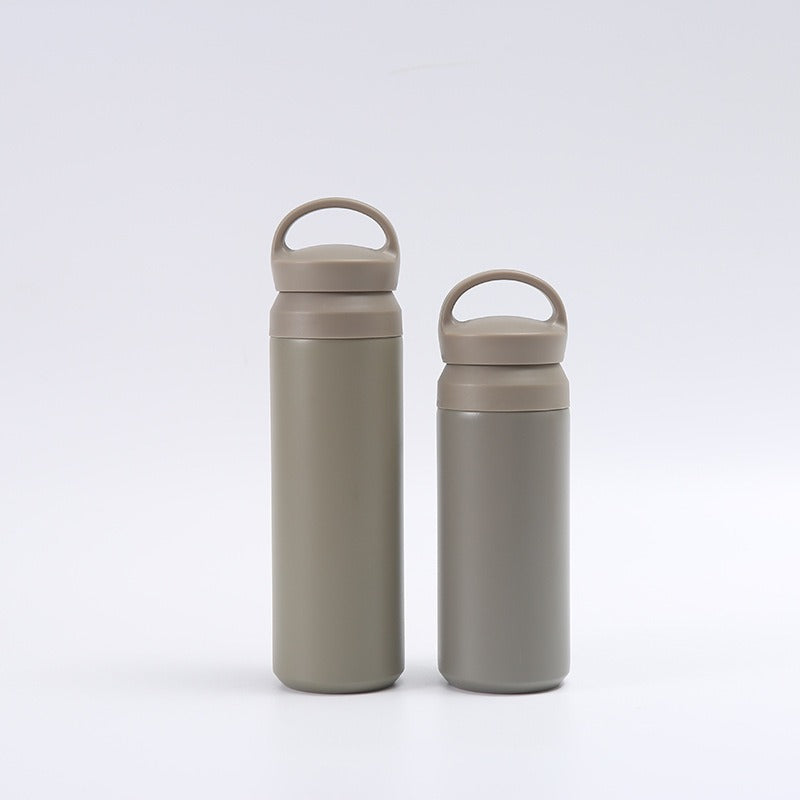Women's premium insulated drinking bottle with ergonomic grip Bowlift