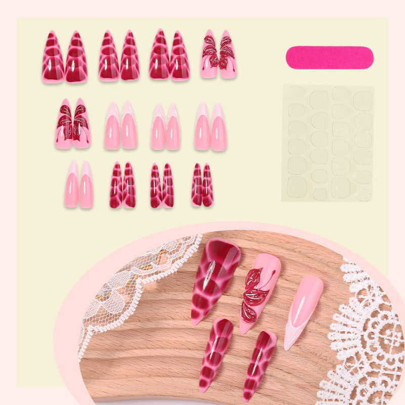 Artificial nail creations with creative patterns and glitter accents Bowlift