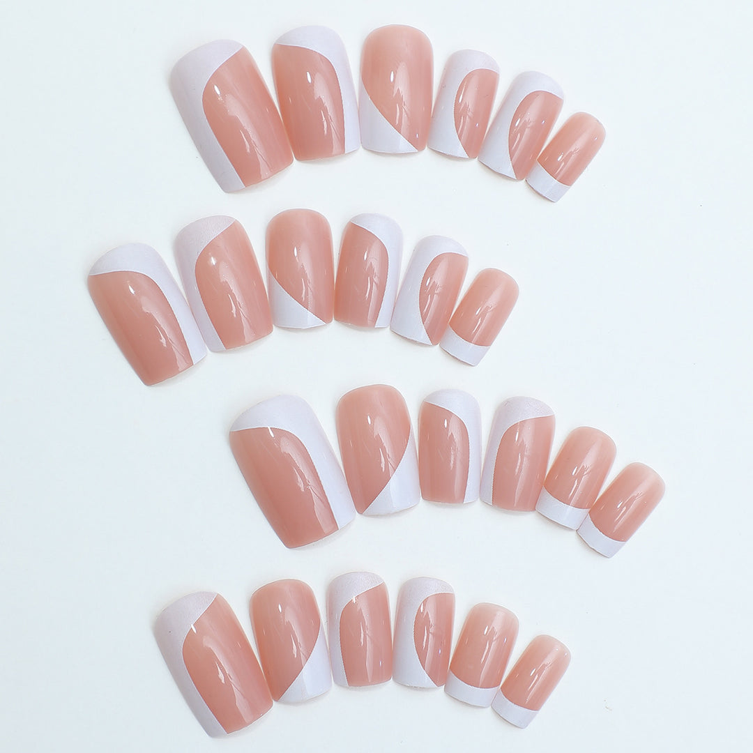 Artificial nail set with elegant French tip design and modern accents Bowlift