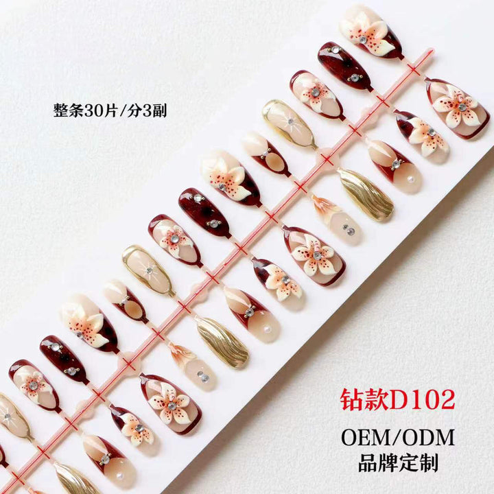 Artistic Press-On Nail Set with Floral Accents Bowlift
