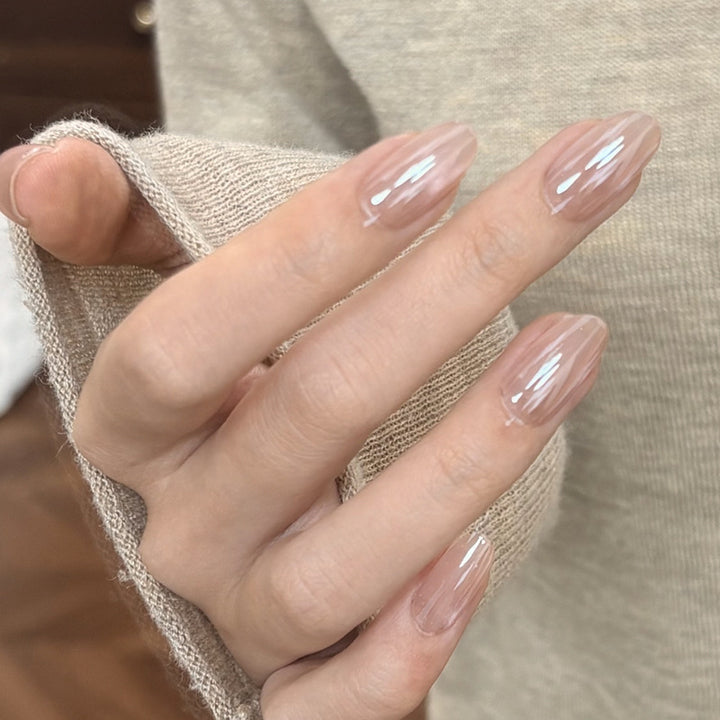 Glossy Nail Art with Subtle Stripes Bowlift