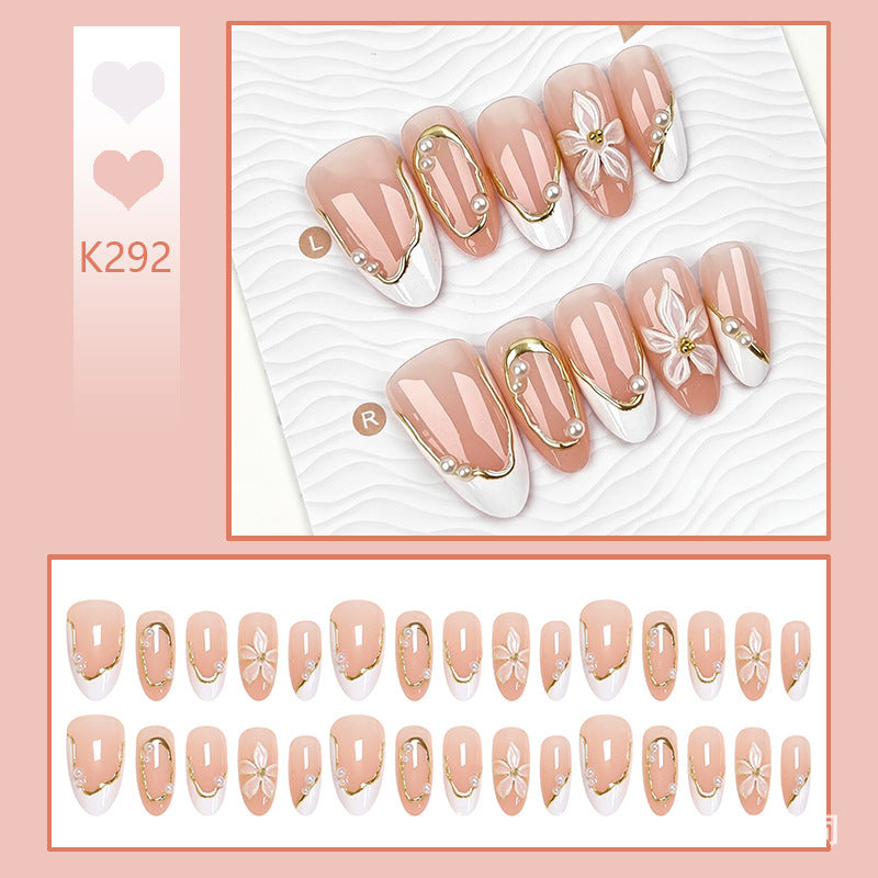 Artificial nail set with elegant floral design and glamorous 3D applications Bowlift