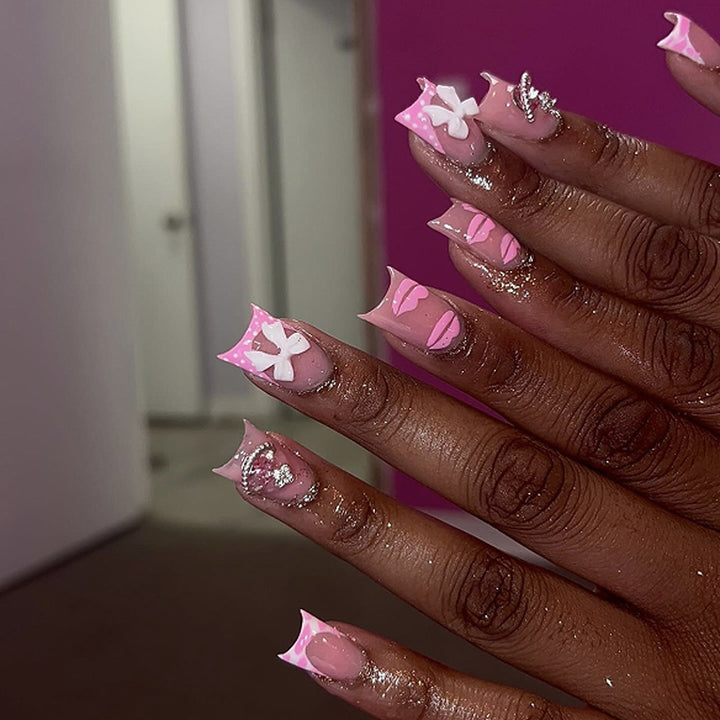 Artful Nail Art with Glitter and Flower Design Bowlift