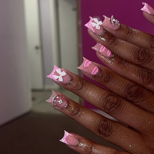 Artful Nail Art with Glitter and Flower Design Bowlift