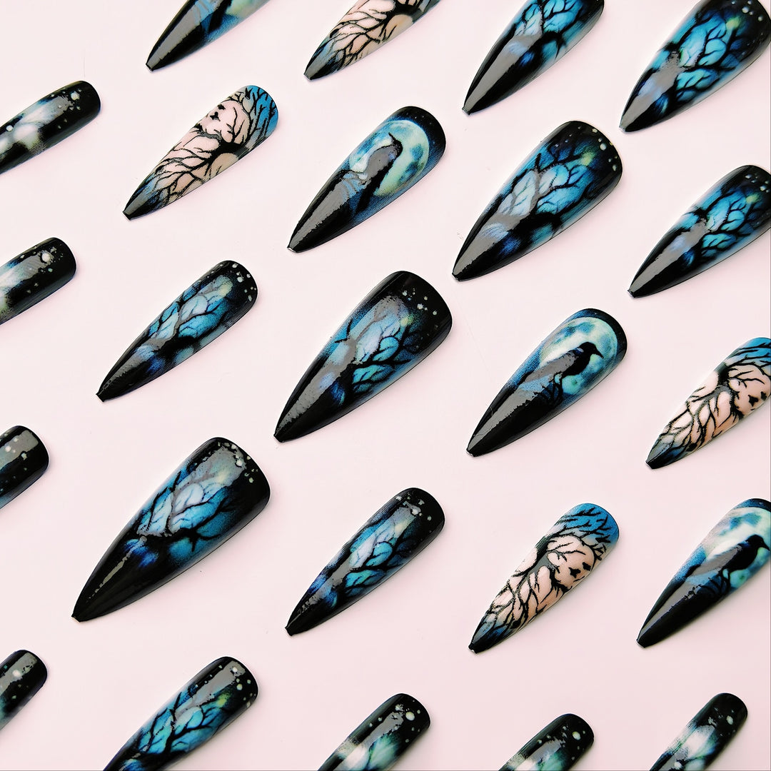 Creative artificial nails with mystical moon and crow design Bowlift