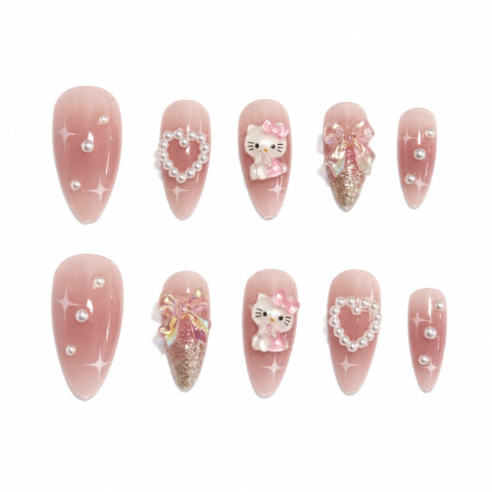 Playful artificial nails with heart and kitty motifs Bowlift