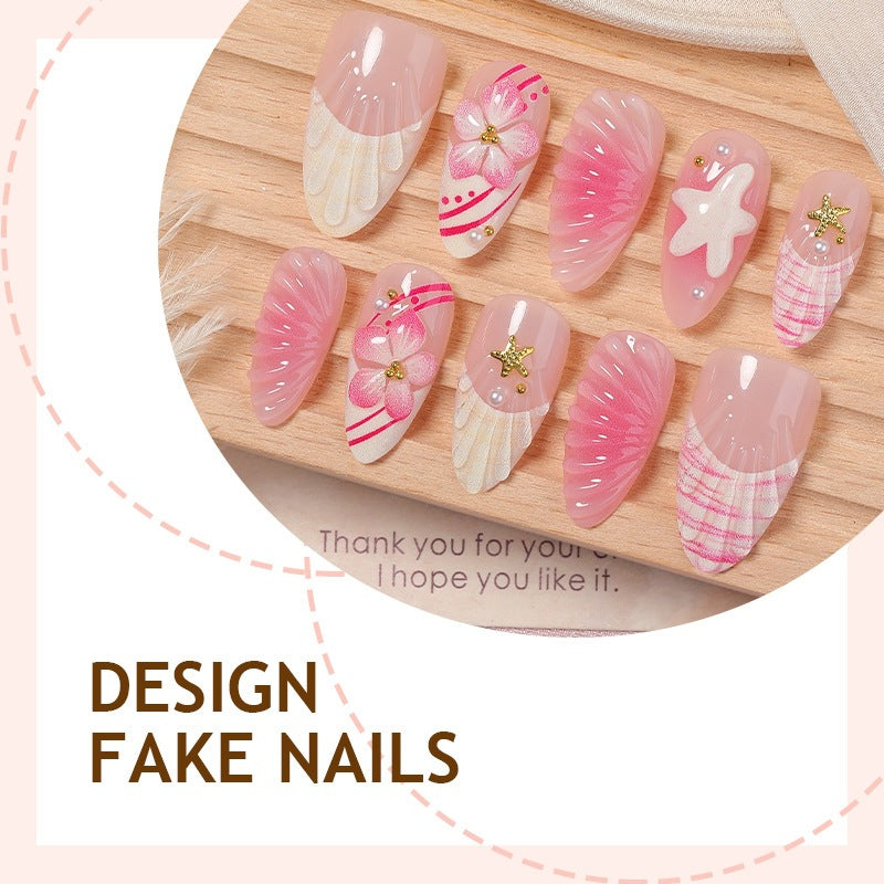 Artificial nail set with maritime shell and flower design Bowlift