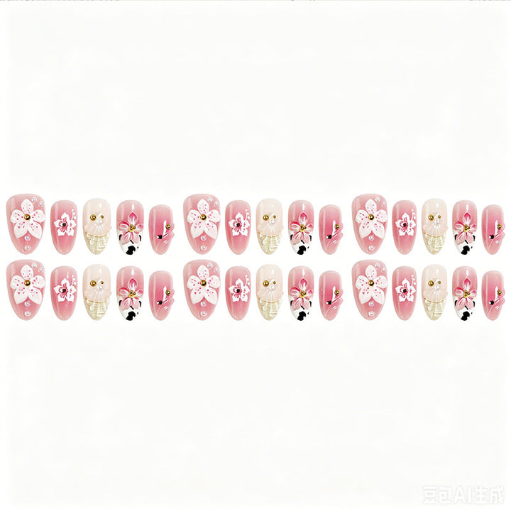 Luxurious artificial nails with floral decorations Bowlift
