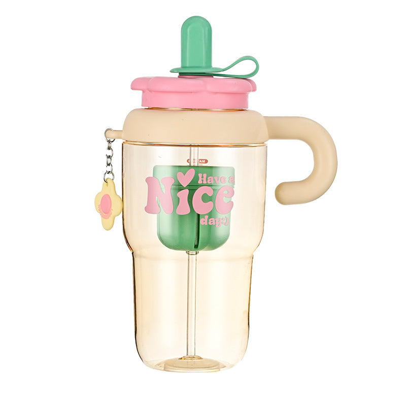 Unisex drinking cup with integrated straw and spill protection Bowlift