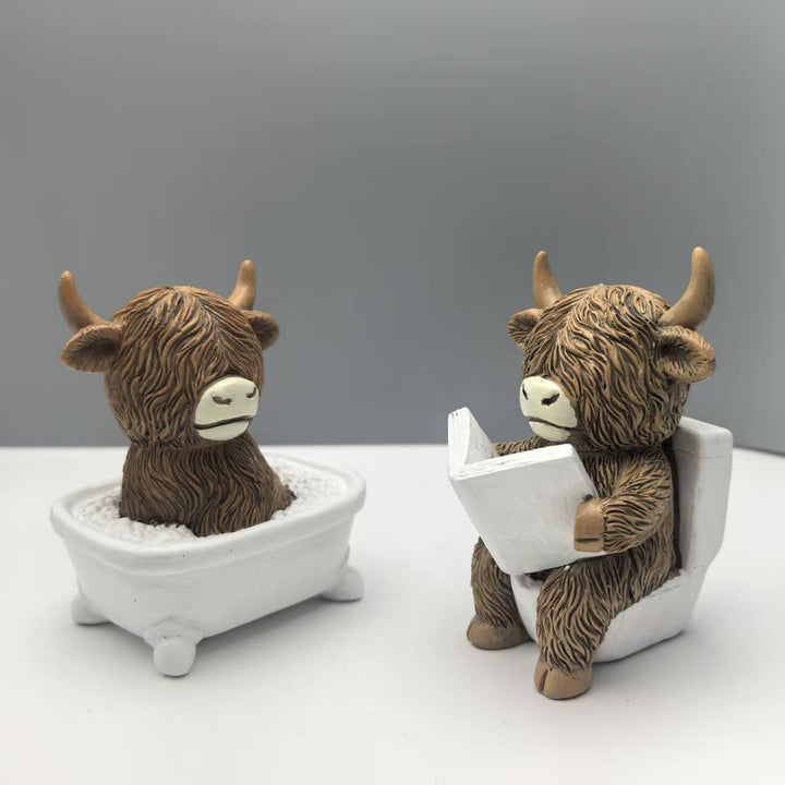 Funny decorative figure of a Highland cow in a bathtub Bowlift