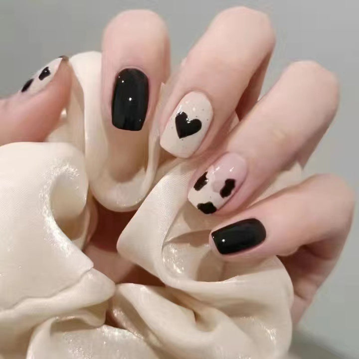 Creative nail art with heart and animal motifs Bowlift