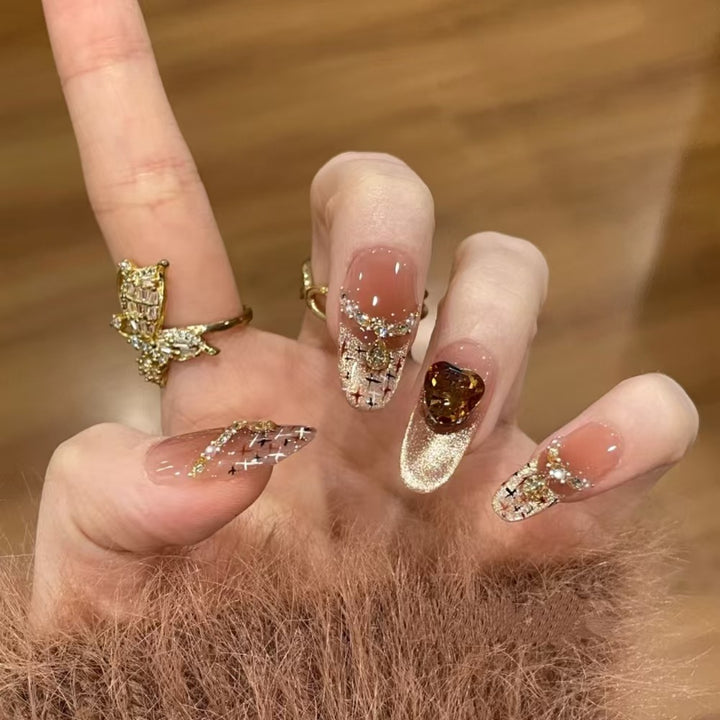 Artificial nails with glamorous rhinestone decorations Bowlift