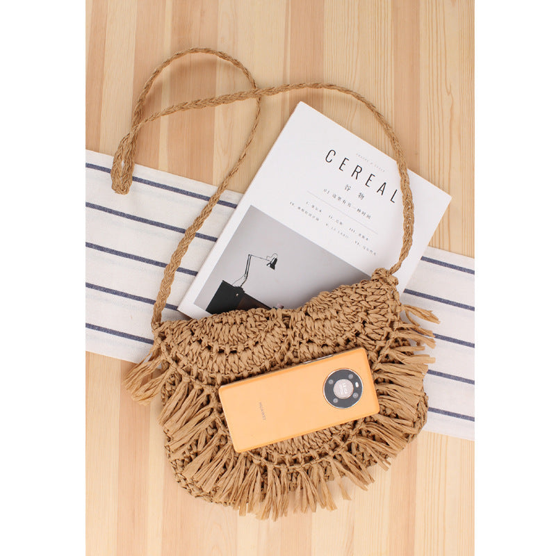 Handcrafted macrame shoulder bag with fringed design Bowlift