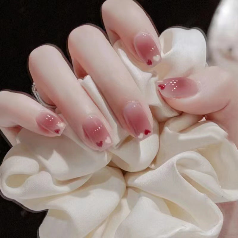 Glamorous artificial nails with delicate flower and glitter effects Bowlift