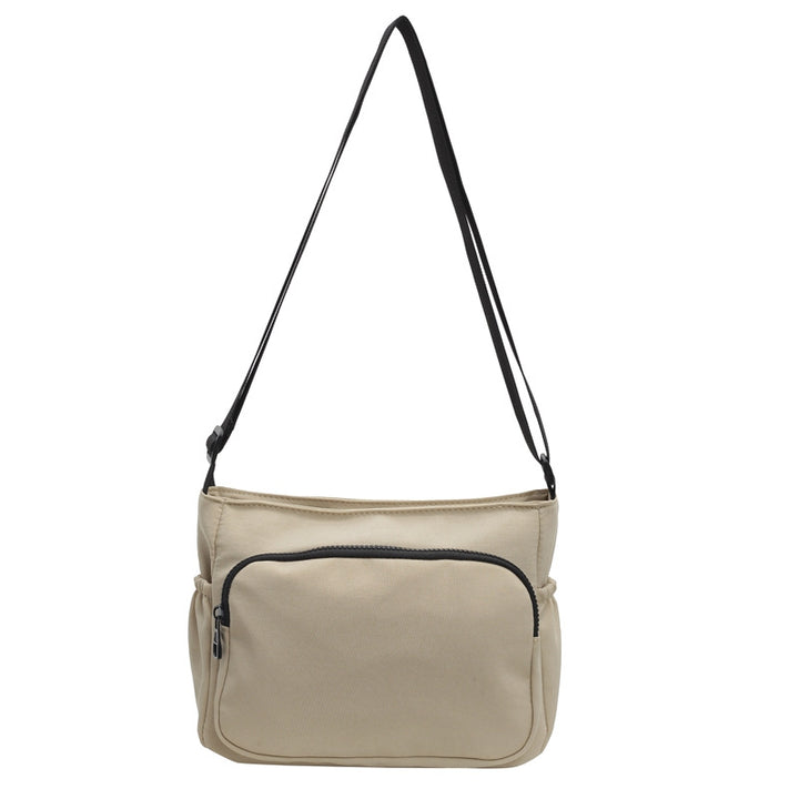 Practical shoulder bag with versatile storage compartments Bowlift