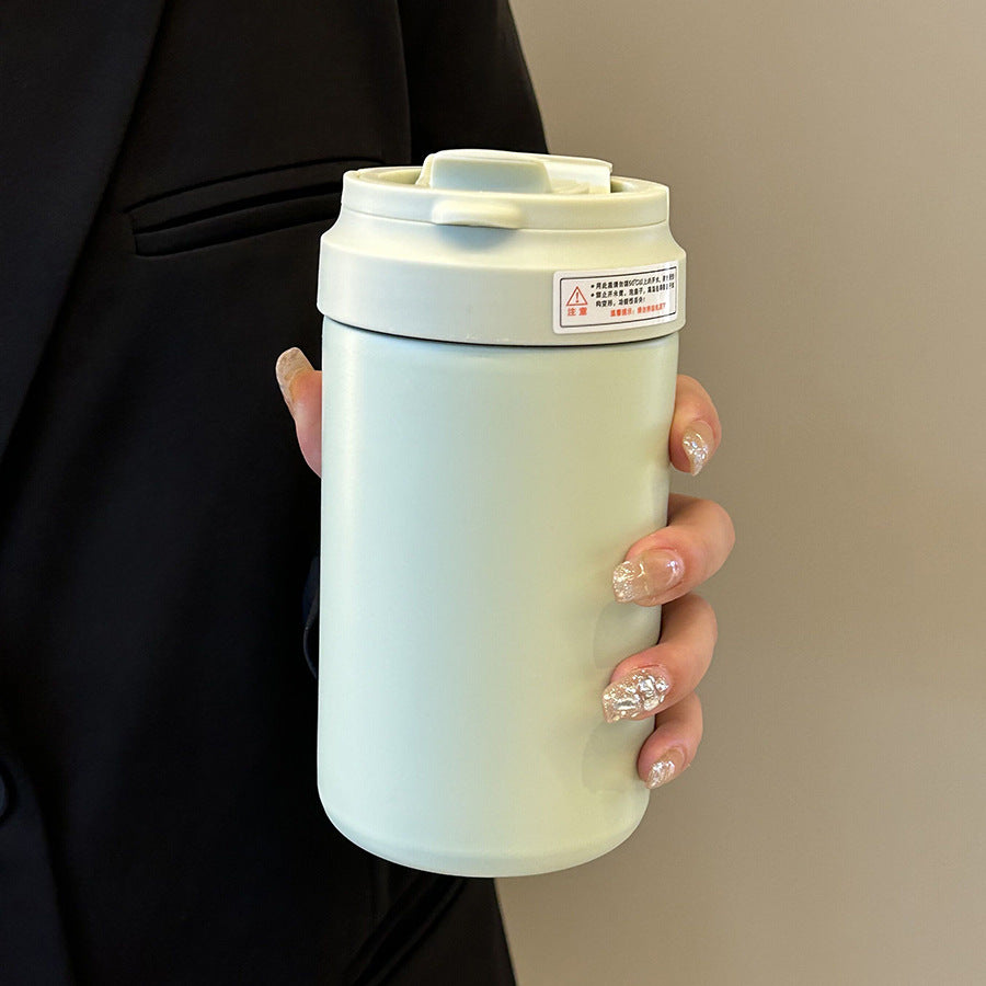 Women's insulated mug with practical spill protection and comfortable carrying handle Bowlift
