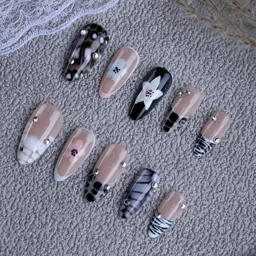 Nail art with elegant designs and embellishments Bowlift