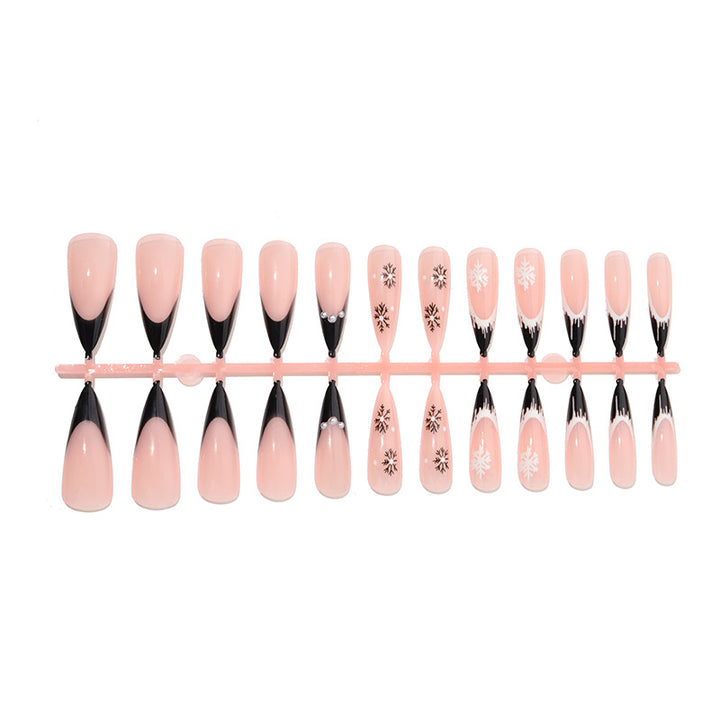 Artistic Stiletto Press-On Nail Set with Decorative Snowflake Designs Bowlift