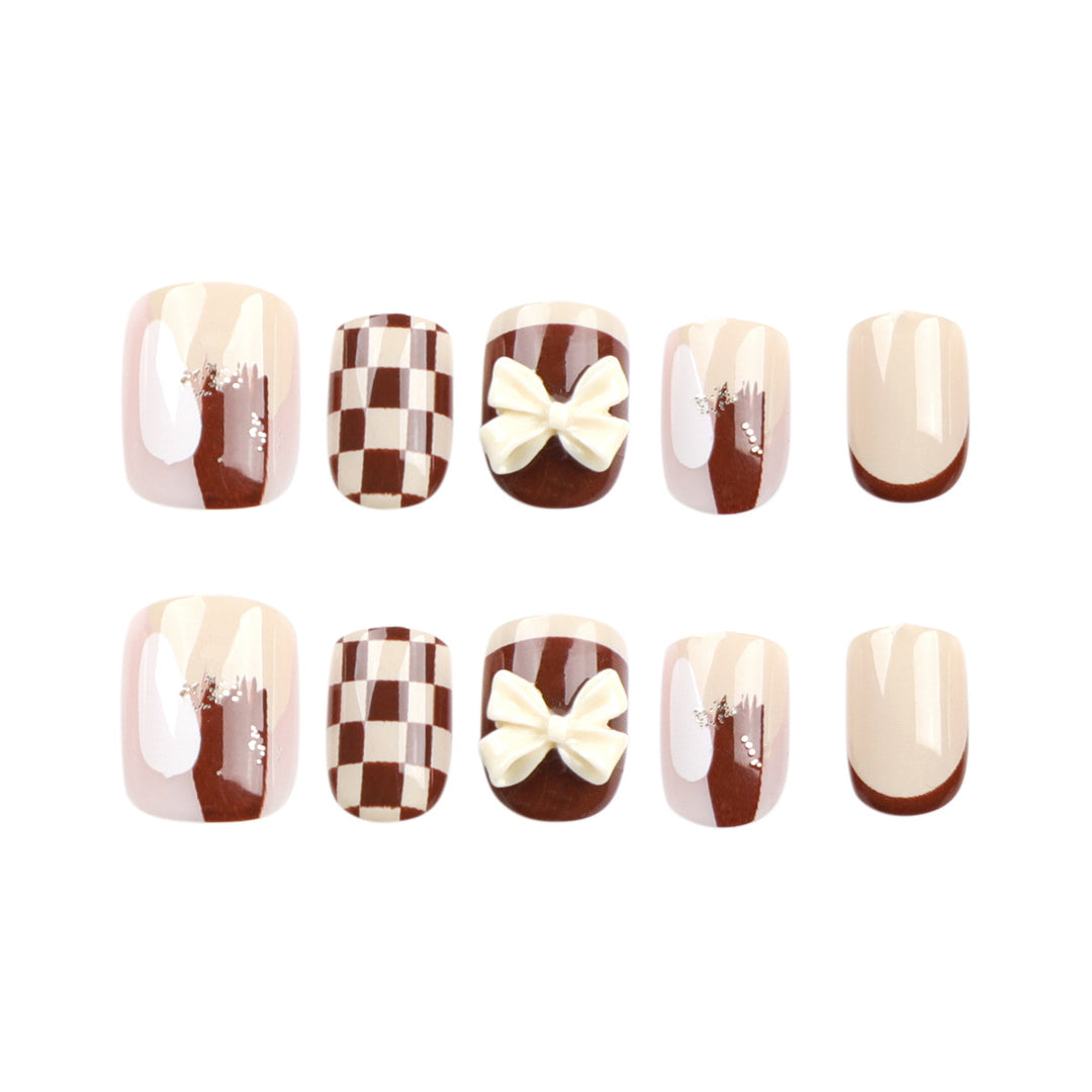 Creative Nail Art with Modern Patterns and Bow Motifs Bowlift