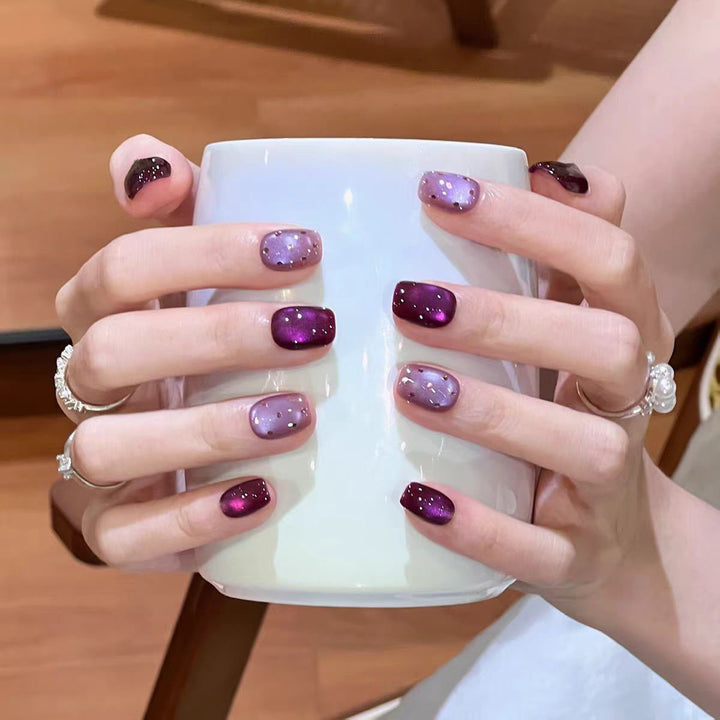 Artificial nails with elegant ombre effect and glitter coating Bowlift