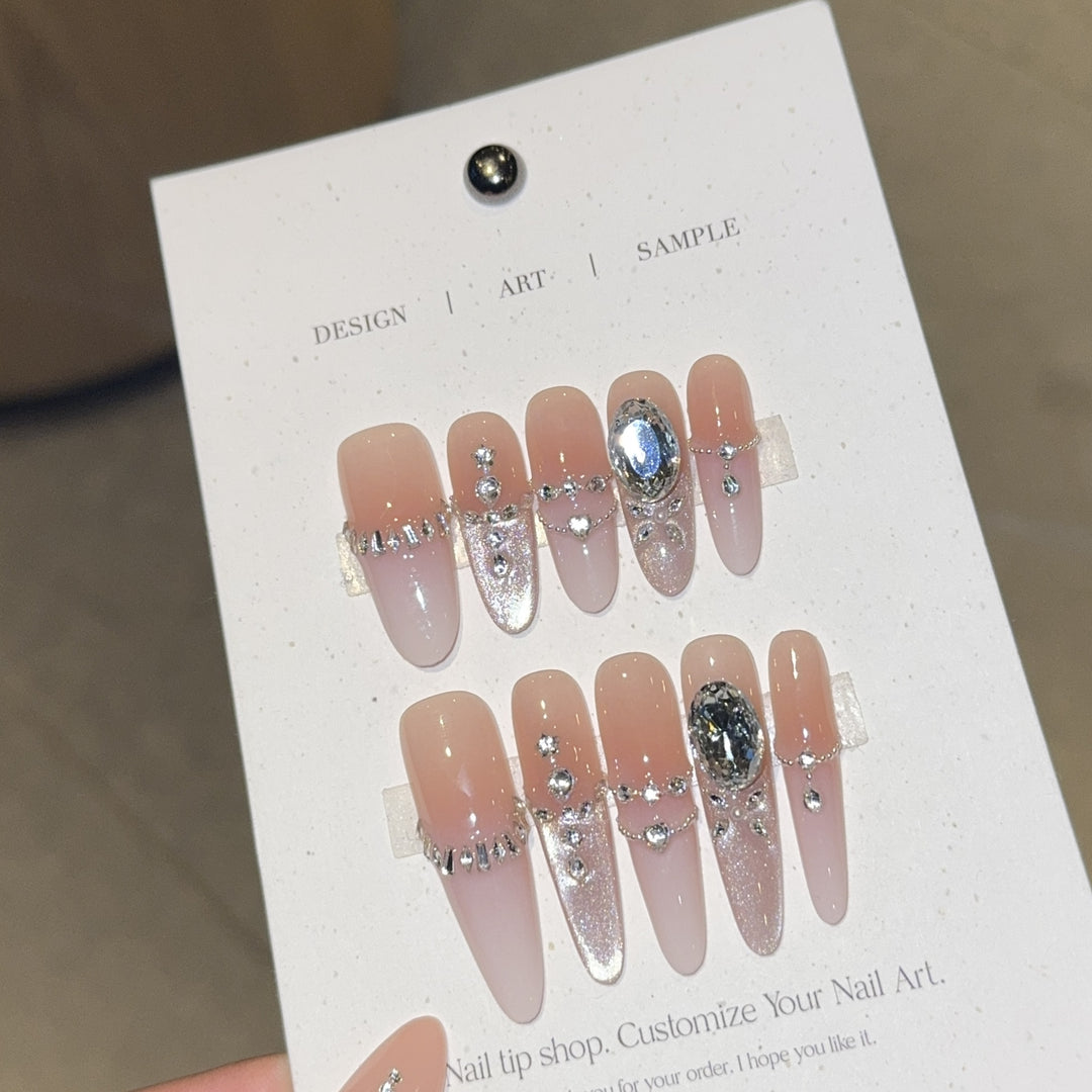 Artificial nails with elegant crystal decorations Bowlift