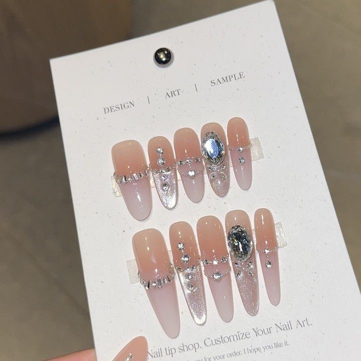 Artificial nails with elegant crystal decorations Bowlift