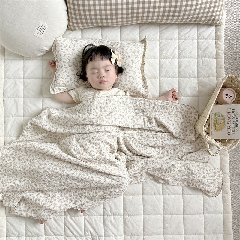 Unisex Muslin Blanket with delicate floral design and elegant ruffles Bowlift