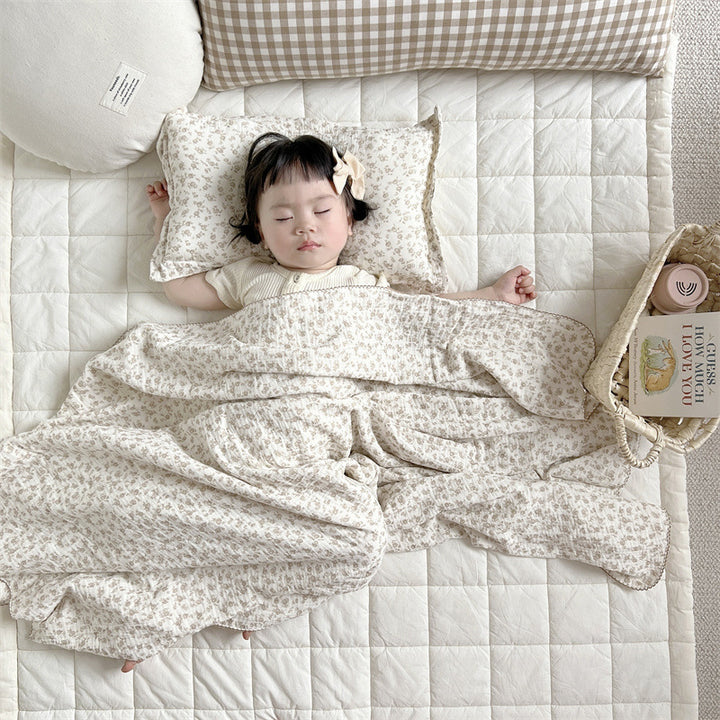 Unisex Muslin Blanket with delicate floral design and elegant ruffles Bowlift