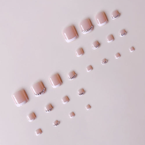 Nail art set with elegant French design and sparkling accents Bowlift