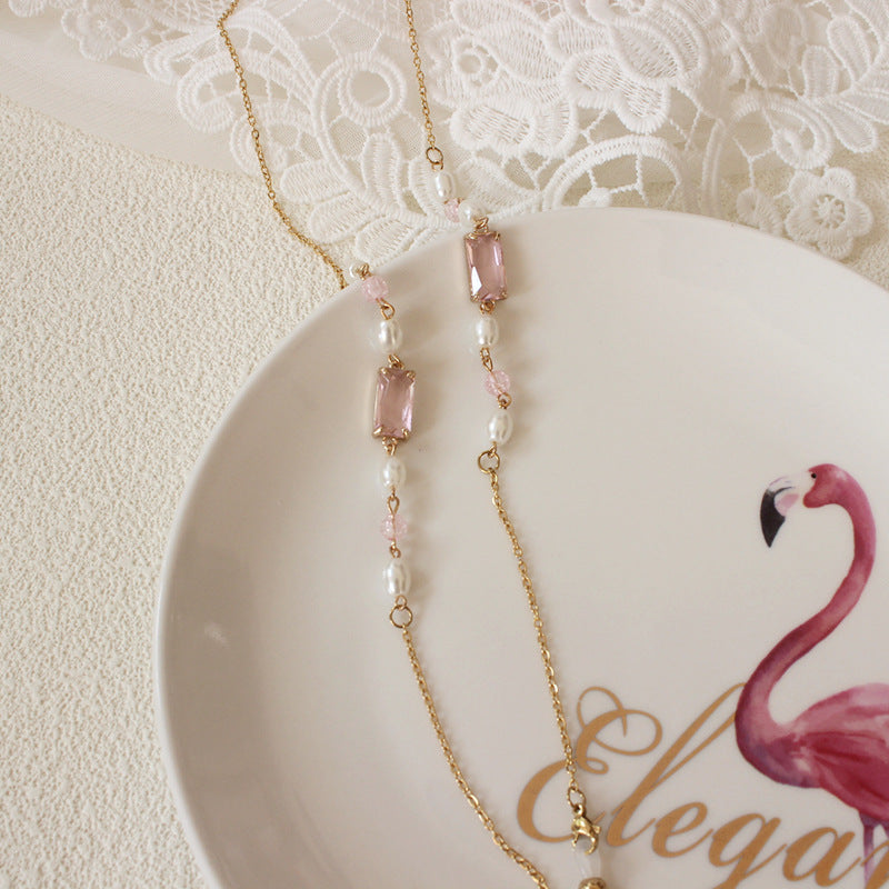 Elegant necklace with pearls and pink accents Bowlift