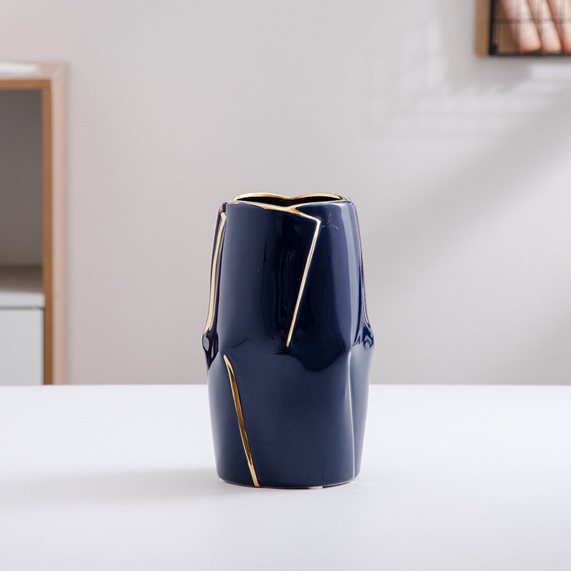 Decorative ceramic vase with golden accents Bowlift