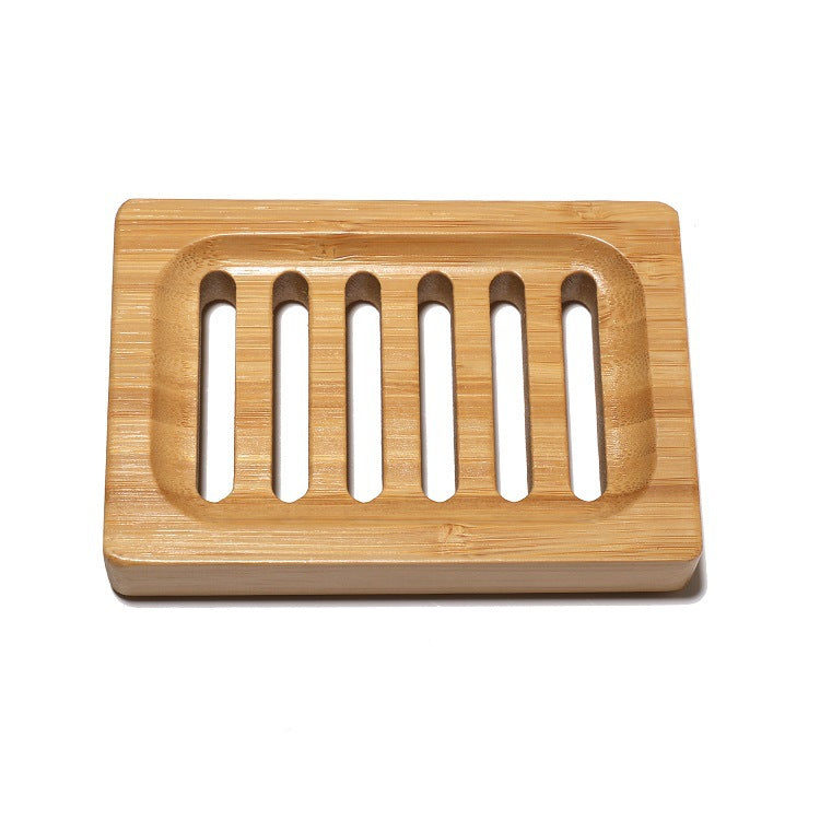 Bamboo soap dish with raised drainage grooves Bowlift