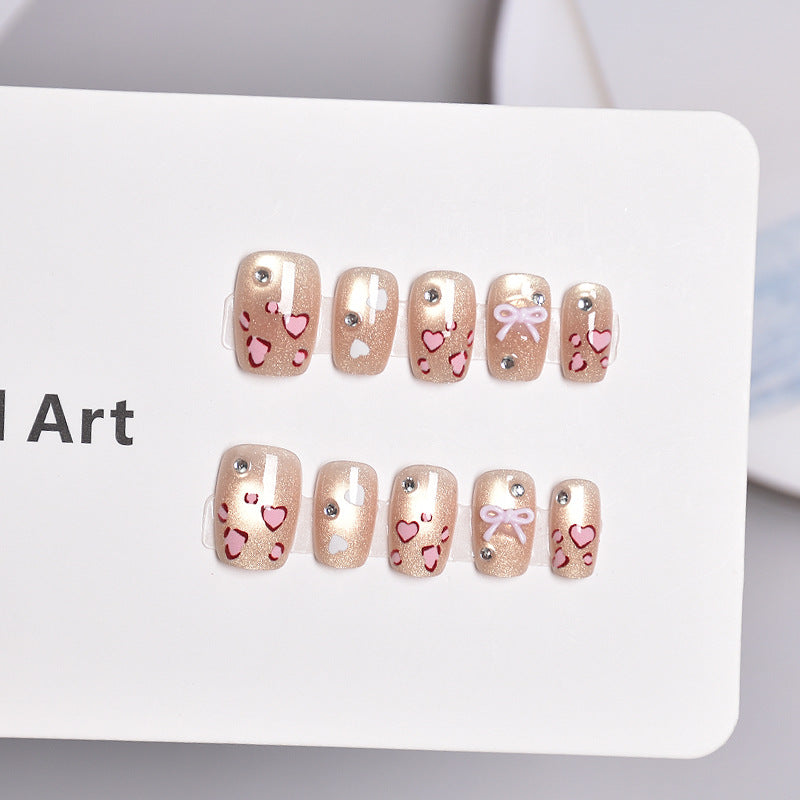 Artistic Press-On Nail Set with Heart and Bow Designs Bowlift