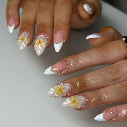 Artistic Stiletto Nails with Floral Accents Bowlift